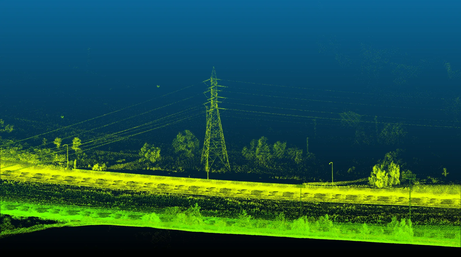 Elevation-coloured point cloud of a linear road corridor with transmission towers